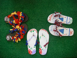 Three pairs of arts & crafts sandals made by children